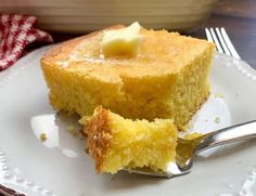 a piece of cake on a plate with a fork