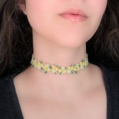 "A cheerful yellow rose necklace that belongs in a fairy garden! Featuring a two toned yellow flower chain with tiny green leaves, this choker adds the perfect dose of whimsy to your look. The length shown in photos is 12\" and more options are available. Each size comes with an additional 2.5\" extender chain. When selecting necklace length, measure around the smallest part of your neck. If you're in between sizes, go for the next smallest size and use the extender chain for the perfect fit! If Adjustable Yellow Flower Charm Necklace, Dainty Yellow Flower Necklace, Delicate Yellow Flower Necklace, Yellow Flower Jewellery, Yellow Choker, Fairycore Jewelry, Yellow Flower Necklace, Vine Necklace, Rose Vine