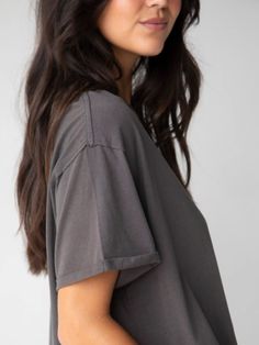 Super soft with exposed details, this relaxed tee is made for all-day comfort! Relaxed Soft-washed T-shirt With Shirttail Hem, Gray Soft-washed Graphic Tee, Relaxed Soft-washed Top With Shirttail Hem, Relaxed Fit Tops For Layering, Everyday Washed Black Relaxed Fit Top, Everyday Relaxed Fit Washed Black Tops, Relaxed Everyday Tops With Shirttail Hem, Oversized Soft-washed Gray Tops, Soft-washed Relaxed Tops For Casual Wear