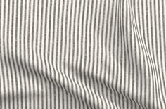 a white and black striped shirting fabric