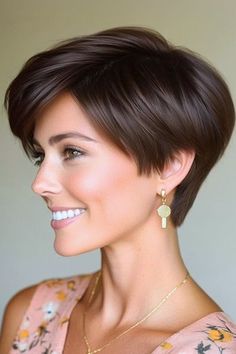 Save this pin for the best pixie haircuts for thick hair. This sleek cut offers a polished look for thick, straight hair. The stacked back creates appealing volume while keeping the nape area short and neat. Pixie Bobs For Thick Hair, Short Hair Cuts For Thick Straight Hair, Stepped Haircut, Stacked Bob Haircut For Thick Hair, Dark Hair Pixie Haircut, Longer Pixie Cut, Pixie For Thick Hair, Haircut Ideas For Girls, Stacked Pixie