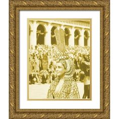 an old photo of a woman wearing a headdress in front of a crowd