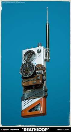 an old fashioned radio and other items are stacked on top of each other in front of a blue background