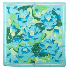 Collectible Hermès Fleurs de Lotus silk scarf by Christiane Vauzelles. 100% silk twill with hand-rolled edges. Does not include box. Minor stains . Hermes Silk Scarf, Hermes Twilly, Hermes Silk, Silk Twill Scarf, Blue Lotus, Vintage Hermes, Hermes Scarf, Silk Twill, Green Silk