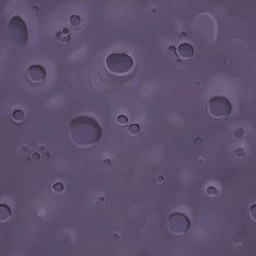 water drops are seen on the surface of a purple substance