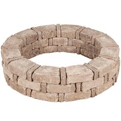 a stone circular fire pit with no cover on it's sides and an opening in the middle