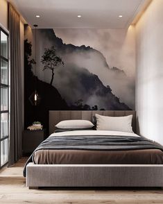 a large bed sitting in a bedroom next to a wall with a painting on it