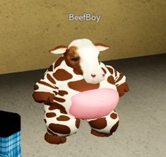 a cow is holding a pink ball in it's mouth