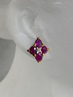 Burmese Ruby with Natural Diamond 18K Solid Gold. Weight of natural ruby 8pcs-1.33ct. Weight of natural diamond 2pcs-0.25ct. Length and width of earring 10.56x8.8mm. Each ruby 3.47x3.2mm average. Total weight of earring 2.7gm. Natural Burmese ruby heated, colour red transparent. Clarity - VVS / VS Origin of ruby -Mong Hsu Burma (Myanmar) Condition -Brand New Certificate of Guarantee. Made in Myanmar (Burma) Ready to ship in next day. Please feel free to message me for any questions related to the piece. Ruby Gemstone Diamond Earrings For Formal Occasions, Formal Ruby Gemstone Diamond Earrings, Fine Jewelry Ruby Diamond Earrings, Ruby Gemstone Diamond Earrings In Fine Jewelry Style, Ruby Diamond Earrings Fine Jewelry, Ruby Diamond Earrings In Fine Jewelry Style, Ruby Diamond Earrings With Prong Setting For Anniversary, Ruby Earrings With Prong Setting For Anniversary, Pear-shaped Ruby Gemstone Earrings