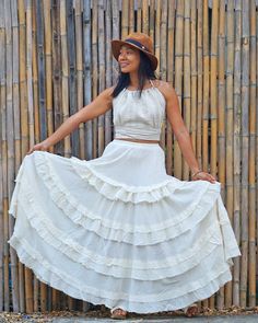 "Maxi Cotton Skirt, Long Cotton Skirt, Boho Maxi Skirt Tiered full circle long skirt made from unbleached and undyed raw cotton in off-white color. Sizing: Made in one size to fit S to XL / US: 4/6/8/10/12/14 Measurement; Elastic waist 24-40\" Hip max 50\" Length 41\" Bottom hem circumference 100\" **Model is a size US 6. 33\" bust, 36\" hip. 165 cm tall** Description: Stunningly beautiful maxi full circle skirt made from raw cotton material. Lined with the same fabric to knee level (not see-thr Peasant Style Tiered Ruffled Maxi Skirt, Peasant Style Tiered Beach Maxi Skirt, Beach Tiered Peasant Maxi Skirt, Traditional Fitted Skirt For Beach, Traditional Long Skirt For Beach, Traditional Beach Fitted Skirt, Traditional Fitted Beach Skirt, Traditional Long Beach Skirt, Fitted Tiered Maxi Skirt For Festival