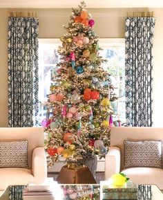 a decorated christmas tree in a living room