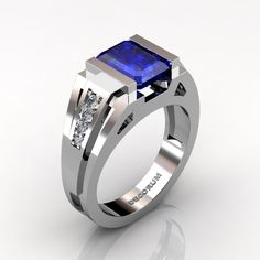 Absolute, luxurious and rich, this men's 14K white gold ring centers a 3.0 carat emerald cut show grade corundum blue sapphire, accented with 8 x round 0.015 to 0.020 carat top quality VS-SI G-H white diamonds. All sizes are available. This unique men's ring showcases sophisticated modern design and statement of true style. Gold weight is approx. 8 grams and ring comes officially stamped 14K. It takes 10 to 12 business days to make and ship Free insured USPS delivery within United States Free in Sapphire Diamond Wedding Ring, Modern Wedding Ring, Modern Mens Rings, Mens Bling, Modern Wedding Rings, Unique Mens Rings, Black Gold Jewelry, Mens Rings, Etsy Wedding Rings