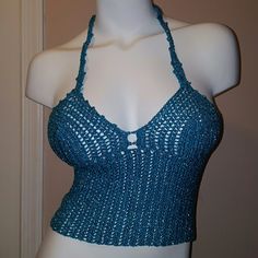 Metallic Silk Crochet Halter Crop Top. Beach Wear Or Wear With Jeans During Day Or Nite Out. Beautiful Turquoise Metallic Color. Fits Size Xsmall Or Small. Mannequin Bust Size Is 36, But Will Look Better On Smaller Sizes Too. Nwt Handmade Blue Tops For Festival, Handmade Fitted Blue Top, Blue Crochet Halter Top For Spring, Blue Stretch Crochet Top For Beach, Fitted Handmade Blue Crochet Top, Blue Stretch Crochet Top, Fitted Blue Crochet Tops, Silk Crochet, Small Mannequin