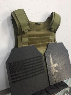 an army vest and patches are on display