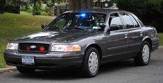 a police car parked on the side of the road