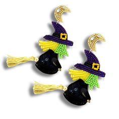 two black and yellow beaded witch hats with tassels on top of each ear