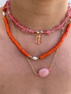 Elevate your style with our Handmade Rose Quartz and Orange Aventurine Necklace. Featuring soft pink rose quartz, known for promoting love and harmony, and vibrant orange aventurine, the stone of creativity and confidence, this  necklace is perfect for everyday wear or special occasions. Handcrafted with care, it's finished with a durable stainless steel clasp. Treat yourself or gift it to someone special. Pink Crystal Necklace With Natural Stones, Dainty Pink Beaded Necklaces For Gifts, Dainty Pink Beaded Necklace For Gift, Pink Dainty Pendant Crystal Necklace, Dainty Pink Crystal Pendant Necklace, Pink Dainty Crystal Pendant Necklace, Pink Bohemian Beaded Pendant Necklaces, Pink Beaded Necklaces With Natural Stones As Gift, Handmade Rose Quartz Beaded Necklace With Round Beads