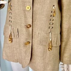 Gorgeous Vintage Linen Jacket With 9ct Gold Plated Maluro Pins With Rams Head -Versace Style - Tan 100% Linen Size French T2/ 40eu Measurements Armpit -To-Armpit 20 Inches Shoulders 18 Inches Length 28 Sleeve 24 Button Closure, Lined , Two Front Pockets. Made In France In Very Good Condition, Light Wear Throughout Embellished Blazer, Rams Head, Versace Style, Safety Pins, Linen Jacket, Vintage Linen, Safety Pin, Vintage Linens, Blazer Suit