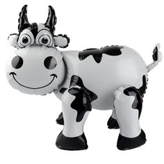 an inflatable cow is standing on its hind legs