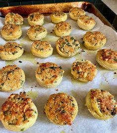 some food that is sitting on a baking sheet and ready to be baked in the oven