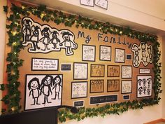 a bulletin board with family pictures on it