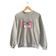 Code : 299 Vintage Budweiser Grey Sweatshirt Women Size Medium Budweiser Crewneck Budweiser Sweater Pullover Print Logo King Of Beer Budweiser Jumper Size on Tag : M Details Measurement  Arm Pit to Arm Pit : 21"inches Back Collar to Hem : 24"inches Condition :  Great Vintage Condition(Used Clothing).No Holes And No Stain.Please refer pictures detail.‼️ Vintage Gray Crew Neck Sweater, Retro Crew Neck Top, Logo King, Beer Hoodie, Vintage Budweiser, Sweatshirt Women, Sweater Pullover, Vintage Sweatshirt, Print Logo