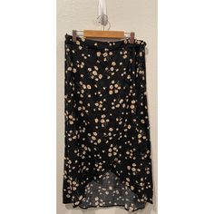 American Eagle Wrap Floral Midi Skirt. Size S New With Tags Measurements Aprox: Waist 14" Length 31.5" 100% Viscose Casual Wrap Pencil Skirt For Spring, Casual Fitted Floral Print Wrap Skirt, Black Mini Wrap Skirt For Spring, Black Mini Wrap Skirt For Summer, Fitted Yellow Wrap Skirt For Spring, Black Casual Wrap Skirt, Relaxed Fit, Black Midi Wrap Skirt For Summer, Summer Yellow Long Wrap Skirt, Casual Black Wrap Skirt For Summer