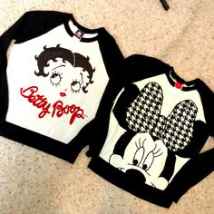 Two Vintage Sweaters. Betty Boop And Minnie Mouse Are Knit Into Both Sweaters. One Is L And One Is Small But They Both Fit Like Mediums So I’m Listing As Such. They Are Worn, Not Brand New. Zoom In To See Details. Playful Black Winter Sweater, Cute Black Sweater For Fall, Cute Black Fall Sweater, Cute Minnie Mouse Tops For Fall, Cute Black Crew Neck Sweater, Betty Boop Black, Betty Boop, Vintage Sweaters, Minnie Mouse