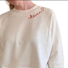 "Custom Embroidered Sweatshirt - This high quality crewneck sweatshirt makes the perfect personalized gift for women and men! ☽ PRODUCT DETAILS ☾ * Sweatshirts are made of  a ringspun cotton/poly blend with super soft sponge fleece interior. * Unisex sizing.  * All shirts are ethically made and verified sweatshop-free. * All embroidery is stitched in our studio in Chicago, IL.  * The font used on all shirts is a handwritten cursive script. See photos for examples of different color and text placement options. ☽ WHAT IS CHAINSTITCH EMBROIDERY ☾ Unlike other embroidered shirts that are stitched on a modern, computerized machine - our shirts are embroidered on an antique 1920s chainstitch machine. This gives the embroidery a vintage feel that you can't get with modern embroidery machines. And Sporty Crew Neck Sweatshirt With Custom Embroidery, Custom Embroidery Crew Neck Sweater, White Crew Neck Sweater With Letter Embroidery, Custom Embroidered Crew Neck Sweater In Relaxed Fit, Custom Embroidered Relaxed Fit Crew Neck Sweater, Relaxed Fit Crew Neck Sweater With Custom Embroidery, Crew Neck Sweatshirt With Letter Embroidery As Gift, Relaxed Fit Sweatshirt With Custom Embroidery And Crew Neck, Custom Embroidery Relaxed Fit Crew Neck Sweatshirt