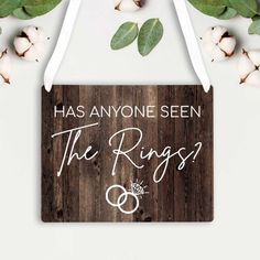 a wooden sign that says, has anyone seen the rings?