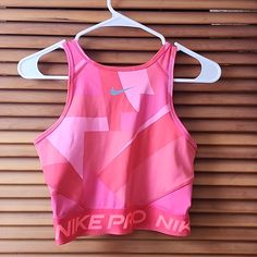 Nwt Pink Nike Pro Bra. No Padding Pink Sleeveless Running Top, Pink Sleeveless Top For Running, Nike Sleeveless Sports Bra With Go-dry, Nike Sporty Pink Tank Top, Nike Pink Sports Bra For Spring, Pink Nike Activewear For Light Exercise, Nike Sleeveless Sports Bra For Summer, Nike Pink Activewear For Light Exercise, Nike Sleeveless Sports Bra