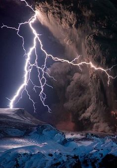 lightning strikes through the sky above a mountain