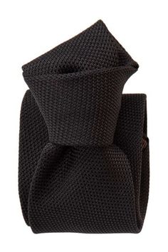 Embrace classic elegance with this black grenadine tie that will give your look understated sophistication and will make a lasting impression. Extra Long Length: Approx. 3.38" x 62.5". A classic tie width and length that is perfect for most men taller than 6'2". 100% silk grenadine garza fina: Garza fina (fine gauze) is a loose weave fabric made from high-twist yarns. It has a slightly knobby texture. Tipped with our signature pinstripe silk: Not only is it a refined finishing touch, it keeps yo Black Dapper Suit And Tie Accessories For Business, Elegant Black Suit And Tie Accessories For Evening, Luxury Fitted Neckwear For Business, Semi-formal Black Suit And Tie Accessories, Luxury Black Ties For Office, Elegant Black Suit And Tie Accessories For Office, Elegant Black Ties For Black-tie Events, Elegant Black Ties For Semi-formal Occasions, Classic Black Suit And Tie Accessories For Formal Occasions