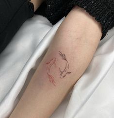 a person with a tattoo on their arm