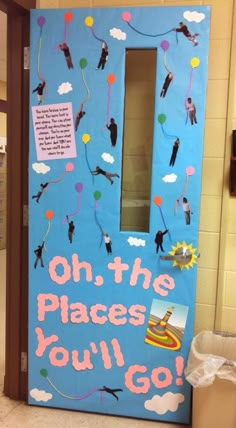 a door decorated with balloons and writing that says oh the places you'll go