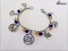 This beautiful Navy Mom Bracelet is beaded with Navy theme Blue Yellow colors. This is the perfect gift for a Proud Navy Mom for any occasion. It includes the Home of the Free Because of the Brave Pendant and all charms you see in the pictures. This is a Great gift idea for a Military Mom! Bracelet Chain, Clasp and Circle Pendant are made of Hypoallergenic Stainless Steel . Charms are zinc Alloy LEAD free. Charms included: Sailor Cap, Anchor charm, Navy pendant, Flag, Navy Mom, and Ribbon Charm Pendant Flag, Proud Navy Mom, Sailor Cap, Mom Pendant, Mom Bracelet, Military Mom, Navy Mom, Anchor Charm, Moms Bracelet