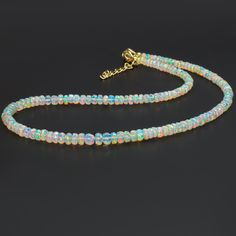 Natural Ethiopian Opal Beads Necklace, White Opal Jewelry, Rainbow Fire Opal Gemstone Necklace for Women, Opal Beaded Jewelry, Birthday Gift Product Detail:- Gemstone - Ethiopian Opal  Beads Size - 4 to 6 MM Beads Color - Natural White Type - Faceted Opal Beads Quality - Top Rare Quality  Fire - Multi Rainbow Fire Origin - Ethiopian Welo   Shipping Service - Free World Wide Shipping Service These Handmade Opal Beaded Jewelry are unique and exclusive to Aimstones shop. You will not find them anyw Gemstone Necklace With Ethiopian Opal Round Beads, Opal Jewelry With Polished Beads As A Gift, Ethiopian Opal Round Beads Jewelry For Gifts, Single Strand Ethiopian Opal Necklace As A Gift, Single Strand Ethiopian Opal Necklace For Gift, Ethiopian Opal Beaded Necklace As A Gift, Ethiopian Opal Beaded Necklace For Gift, Ethiopian Opal Single Strand Necklace For Gift, Opal Single Strand Beaded Necklace For Gifts