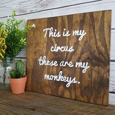 a wooden sign that says this is my circus there are my monkeys