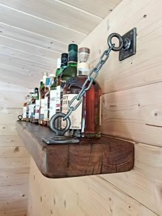 a shelf with bottles and chains on it