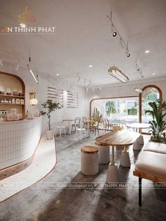 the interior of a restaurant with tables and chairs