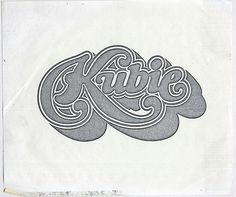 an image of the word klime written in cursive writing on a white paper