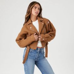 A Woven Jacket Featuring Notched, Lapels, Asymmetrical Zip Up Front, Zippered And Button Front Flat Pockets, Belted Waist With High Polish Buckle And Grommets, Dropped Long Sleeves And A Cropped Hem. Cropped Moto Jacket, Woven Jacket, Forever 21 Jacket, Moto Jacket, Zip Ups, Forever 21, Jackets & Coats, Buckle, Long Sleeves