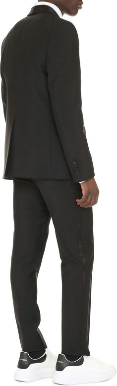 Hey there. This wool and mohair two-piece suit is the perfect combination of classic and modern style. With padded shoulders, front flap pockets, and a chest pocket, the blazer exudes sophistication, while the back slit trousers with satin side stripes add a contemporary touch. It's 60% mohair and 40% wool for a luxurious feel and look. Padded shoulders for a polished look Multiple pockets for convenience 60% mohair and 40% wool for a luxurious feel | Gucci Men's Wool And Mohair Two Piece Suit i Mohair Suit, Polished Aesthetic, Wedding Business, Business Meeting, Side Stripe, Gucci Men, Elevate Your Style, Polished Look, Welt Pockets