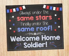 a sign that is on the side of a wooden door saying, welcome home soldier