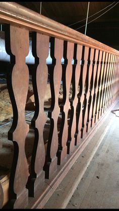 an old wooden railing in a building