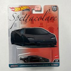 a black toy car is on display in a carded package for the hot wheels movie