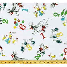 dr seuss and the cat in the hat on white cotton fabric with colorful numbers