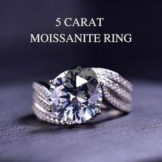 a diamond ring with the words 5 carat moissantee ring on it