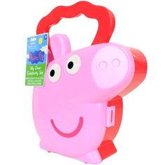 a pink toy with a smiling face on it