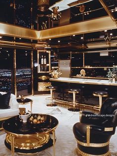 a living room filled with black and gold furniture